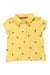 A Yellow Short Sleeve Polos from Tommy Hilfiger in size 3T for neutral. (Front View)