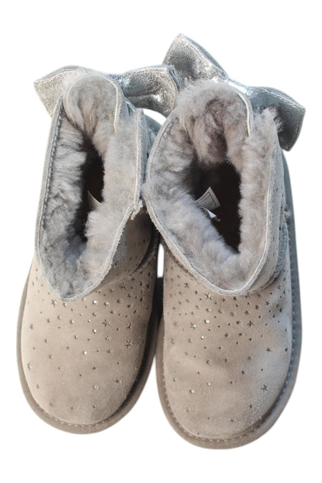 A Silver Winter Boots from UGG in size 6T for girl. (Back View)