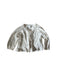 A Ivory Cardigans from Purebaby in size 6-12M for girl. (Front View)