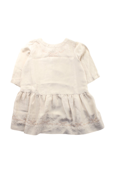 A Ivory Long Sleeve Dresses from Bonpoint in size 4T for girl. (Front View)