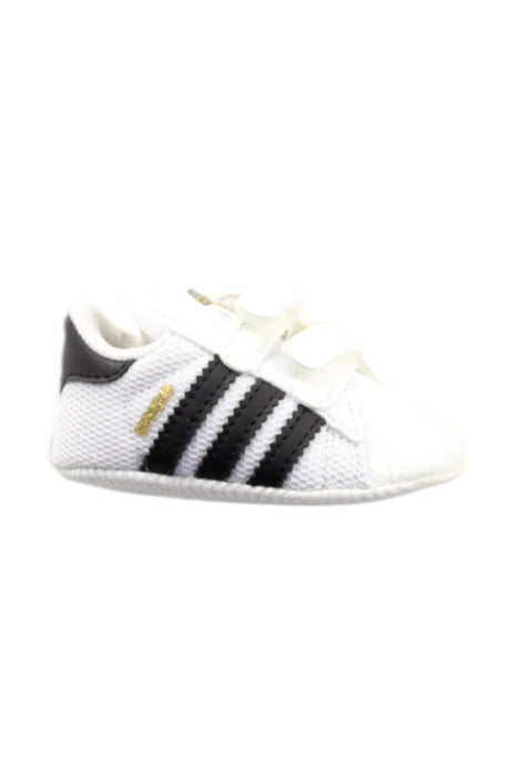 A White Sneakers from Adidas in size Newborn for neutral. (Front View)