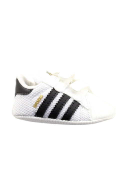A White Sneakers from Adidas in size Newborn for neutral. (Front View)