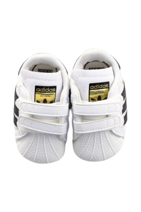 A White Sneakers from Adidas in size Newborn for neutral. (Back View)