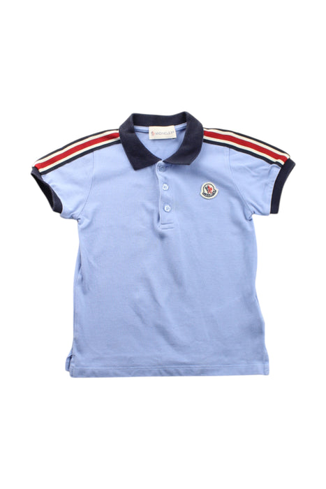 A Blue Short Sleeve Polos from Moncler in size 2T for neutral. (Front View)