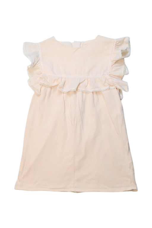 A Peach Sleeveless Dresses from Chloe in size 12-18M for girl. (Front View)
