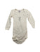 A Beige Long Sleeve Bodysuits from Petit Bateau in size 6-12M for neutral. (Front View)