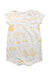 A White Short Sleeve Rompers from Le Petit Society in size 6-12M for neutral. (Front View)
