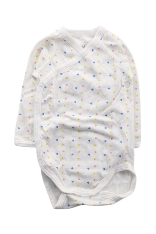 A White Long Sleeve Bodysuits from Petit Bateau in size 3-6M for neutral. (Front View)