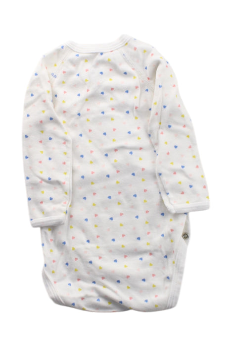 A White Long Sleeve Bodysuits from Petit Bateau in size 3-6M for neutral. (Back View)