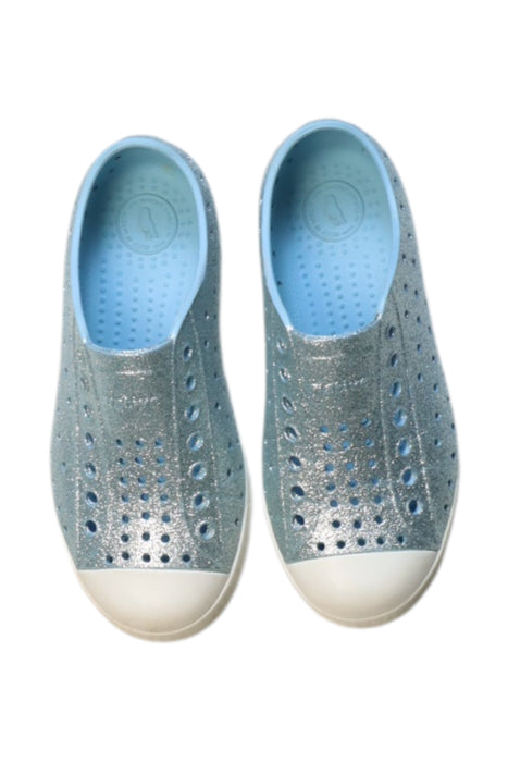 A Blue Slip Ons from Native Shoes in size 5T for neutral. (Front View)