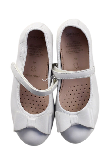 A White Flats from Geox in size 6T for girl. (Back View)