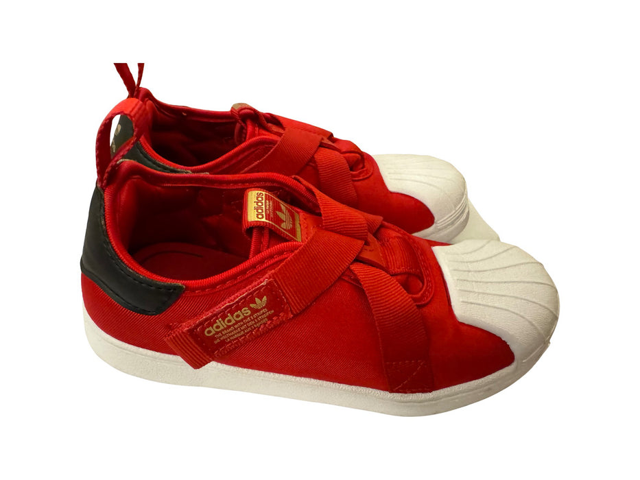 A Red Sneakers from Adidas in size 6T for neutral. (Front View)