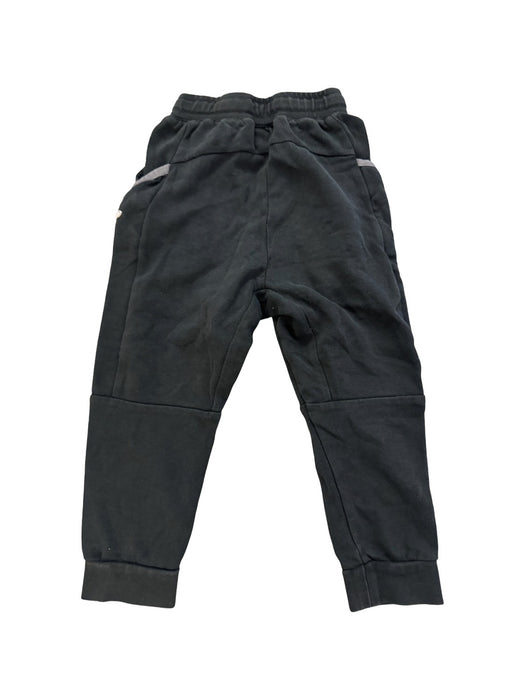 A Black Sweatpants from Nike in size 6T for boy. (Back View)