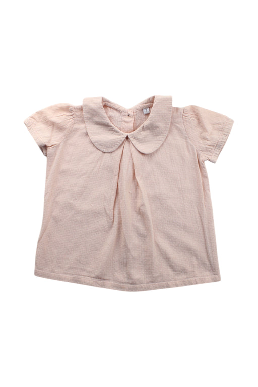 A Peach Short Sleeve Tops from Niny Mini in size 2T for girl. (Front View)