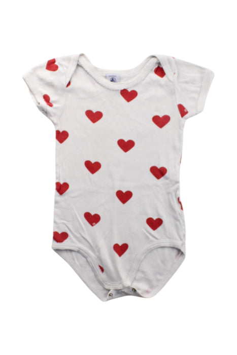 A Red Short Sleeve Bodysuits from Petit Bateau in size 2T for neutral. (Front View)