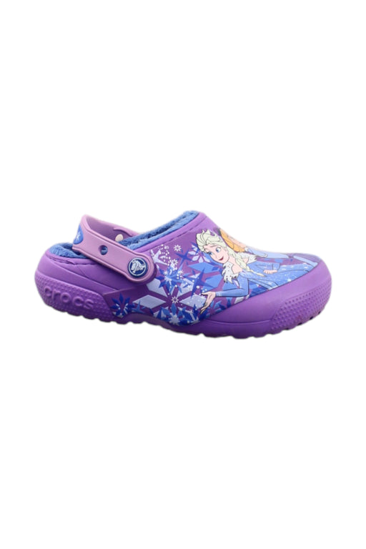A Purple Slip Ons from Crocs in size 5T for girl. (Front View)