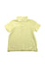 A Yellow Short Sleeve Polos from Nanos in size 10Y for boy. (Front View)