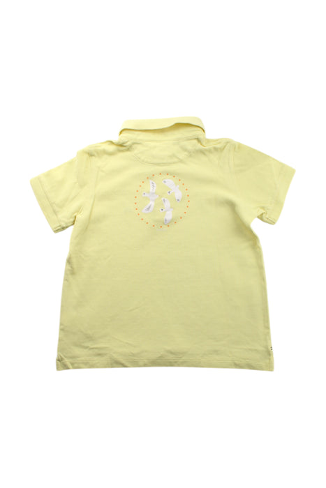 A Yellow Short Sleeve Polos from Nanos in size 10Y for boy. (Back View)