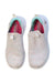 A White Slip Ons from Skechers in size 7Y for neutral. (Back View)