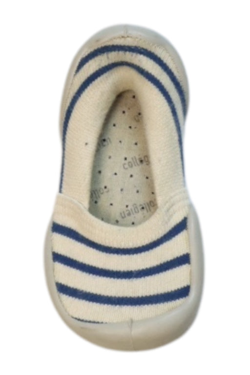 A White Slip Ons from Collegien in size 3T for neutral. (Front View)