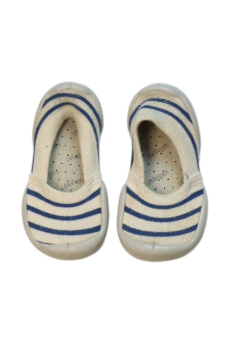 A White Slip Ons from Collegien in size 3T for neutral. (Back View)