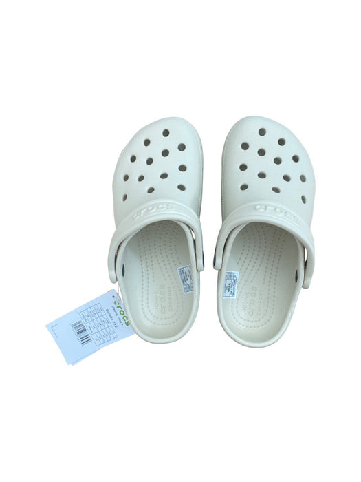 A Ivory Slip Ons from Crocs in size 6T for neutral. (Front View)