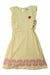 A Yellow Sleeveless Dresses from Bobo Choses in size 4T for girl. (Front View)