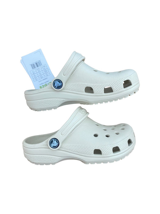 A Ivory Slip Ons from Crocs in size 6T for neutral. (Back View)