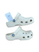 A Ivory Slip Ons from Crocs in size 6T for neutral. (Back View)