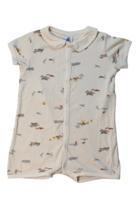 A Beige Short Sleeve Rompers from Petit Bateau in size 12-18M for girl. (Front View)