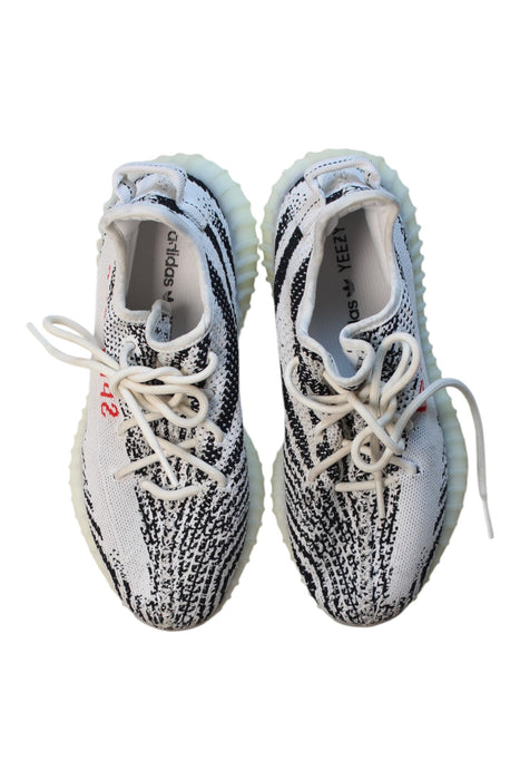 A White Sneakers from Adidas Yeezy in size 14Y for boy. (Back View)