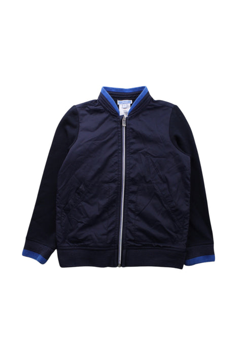 A Navy Lightweight Jackets from Jacadi in size 6T for boy. (Front View)