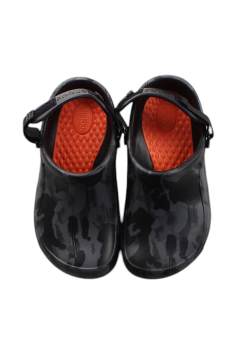 A Black Slip Ons from Crocs in size 12Y for neutral. (Back View)