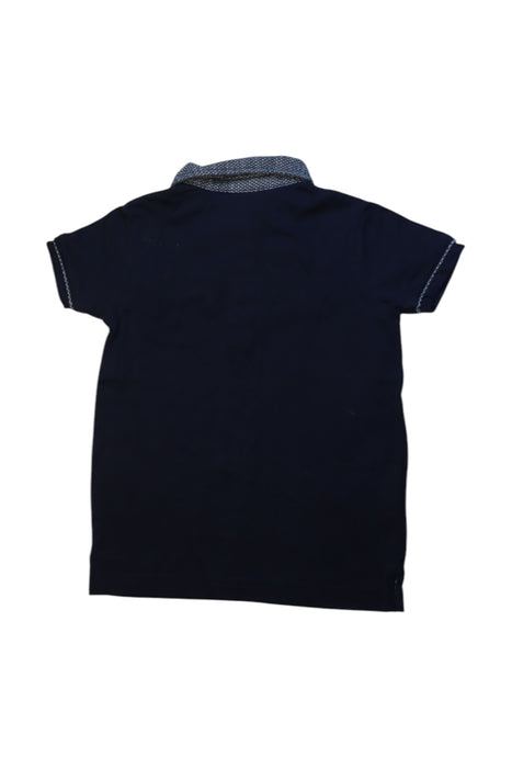 A Navy Short Sleeve Polos from Mayoral in size 5T for boy. (Back View)