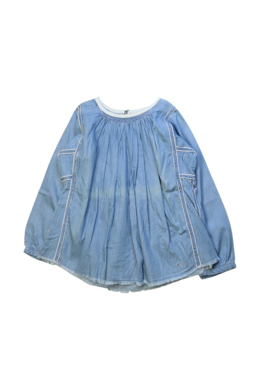 A Blue Long Sleeve Tops from Chloe in size 4T for girl. (Front View)