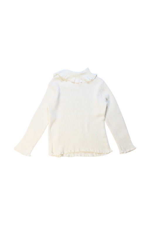 A Ivory Long Sleeve Tops from Momonittu in size 2T for girl. (Front View)