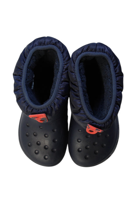 A Navy Winter Boots from Crocs in size 4T for boy. (Back View)