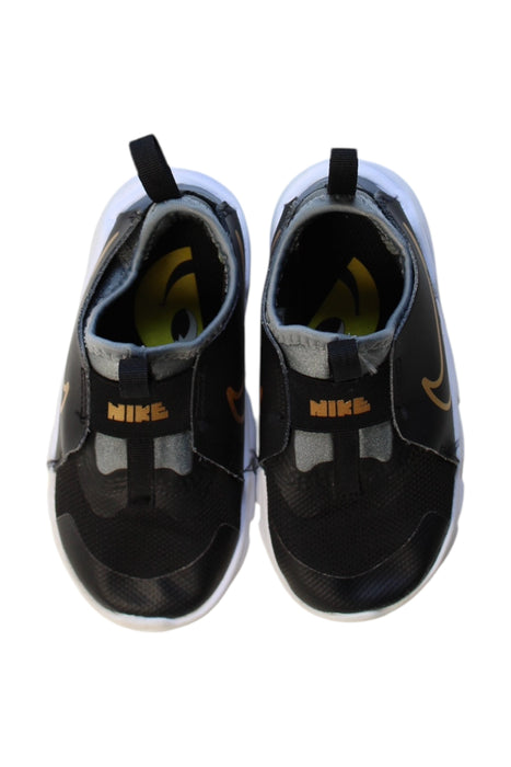 A Black Sneakers from Nike in size 4T for boy. (Back View)