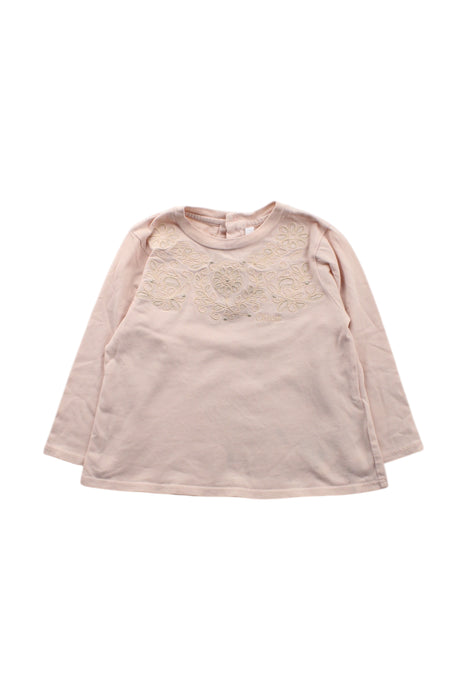 A Pink Long Sleeve Tops from Chloe in size 12-18M for girl. (Front View)