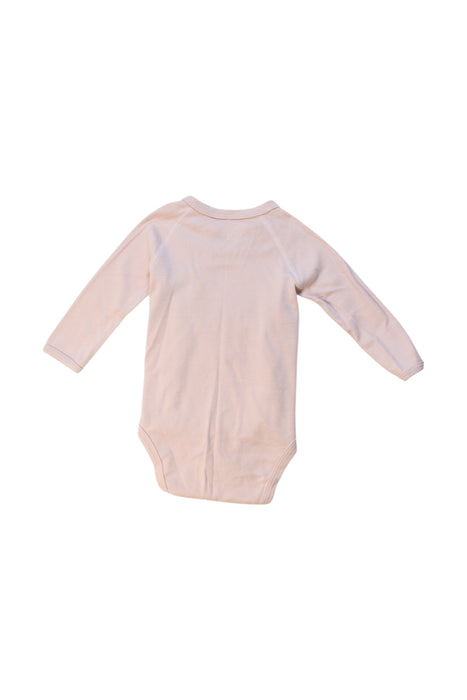 A Peach Long Sleeve Bodysuits from Petit Bateau in size 3-6M for girl. (Back View)