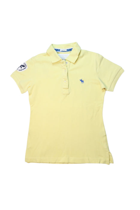 A Yellow Short Sleeve Polos from Abercrombie & Fitch in size 12Y for girl. (Front View)