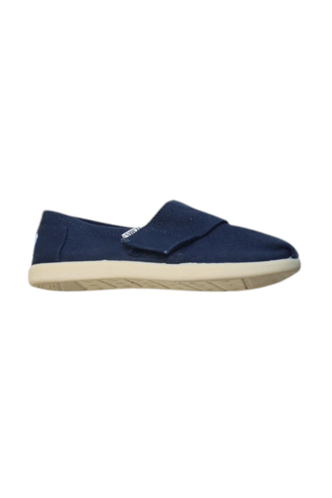 A Navy Slip Ons from Toms in size 5T for neutral. (Front View)
