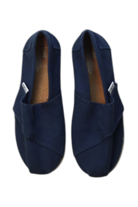 A Navy Slip Ons from Toms in size 5T for neutral. (Back View)