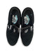 A Black Slip Ons from Vans in size 11Y for neutral. (Back View)