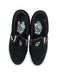 A Black Slip Ons from Vans in size 11Y for neutral. (Back View)