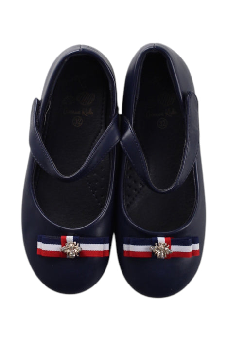 A Navy Flats from Avenue Kids in size 7Y for girl. (Back View)