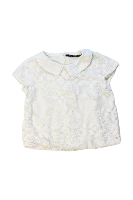 A Ivory Short Sleeve Tops from Little Akiabara in size 4T for girl. (Front View)