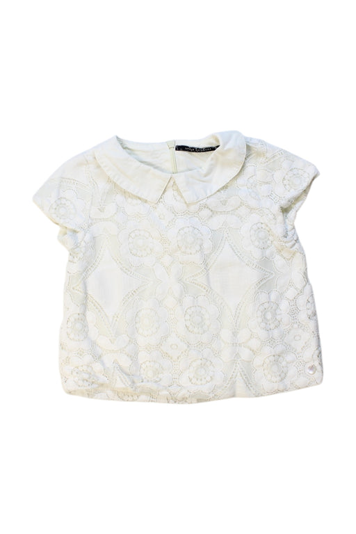 A Ivory Short Sleeve Tops from Little Akiabara in size 4T for girl. (Front View)