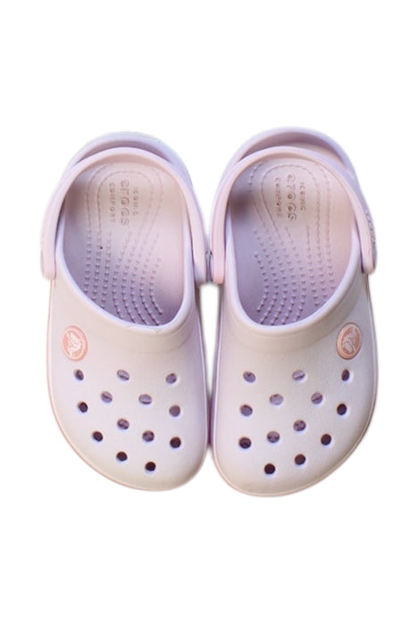 A Pink Slip Ons from Crocs in size 3T for girl. (Back View)