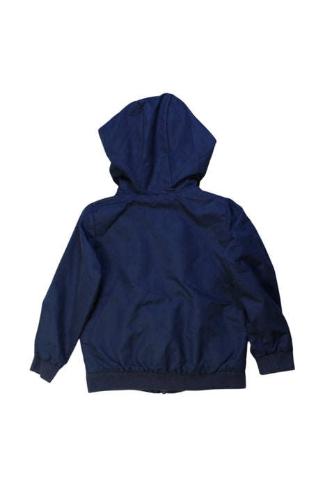 A Navy Rain Jackets from Jacadi in size 5T for boy. (Back View)
